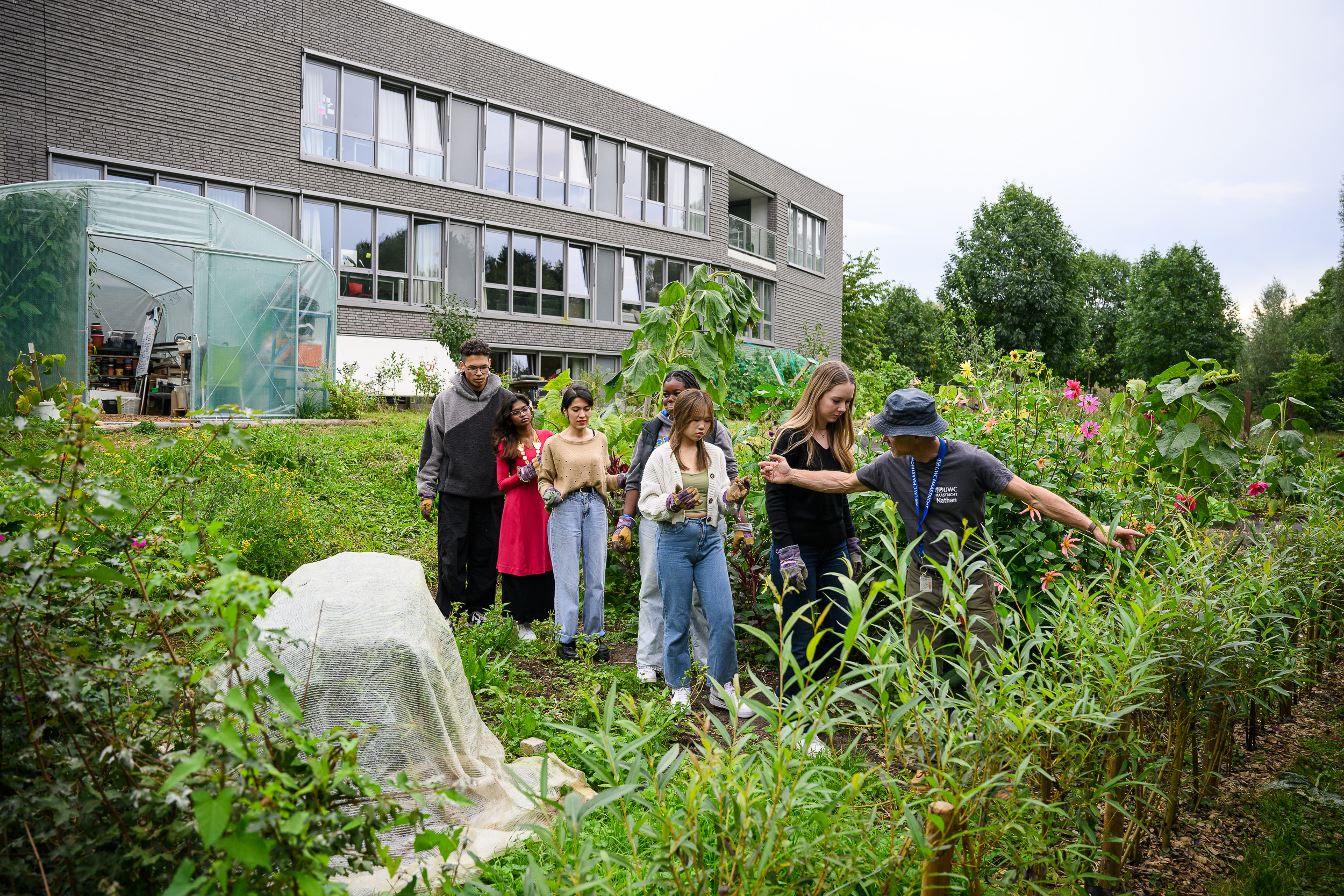 Secondary Students in Garden with Teacher